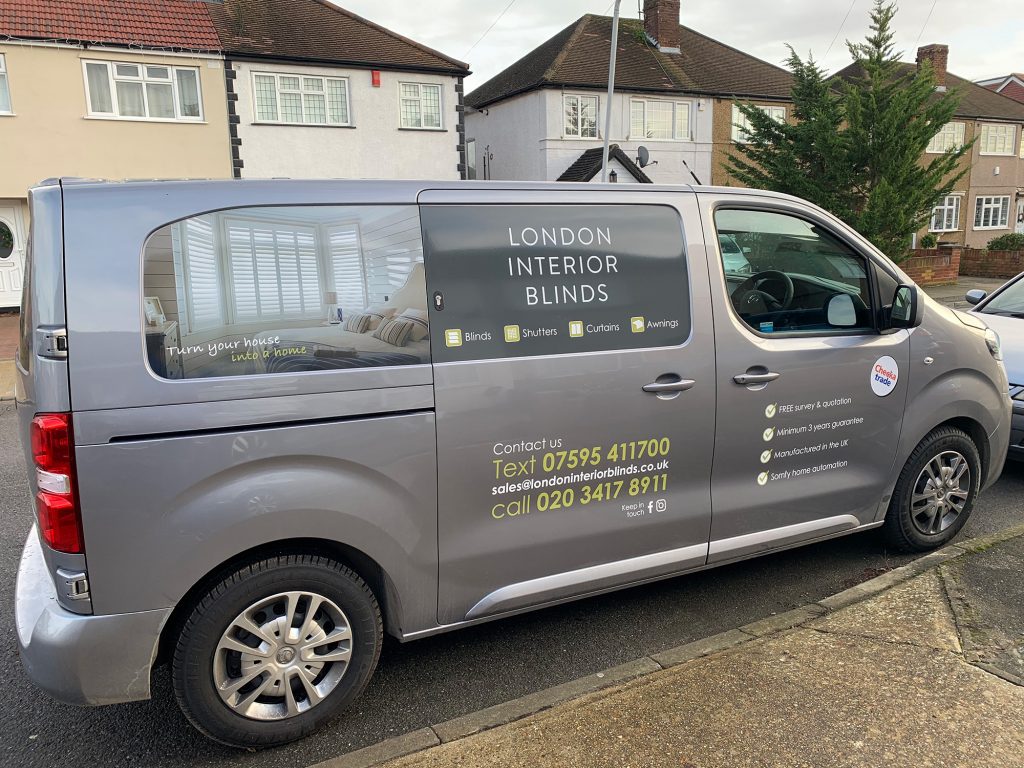 Grey London Interior Blinds van branded with company logo, services and contact details